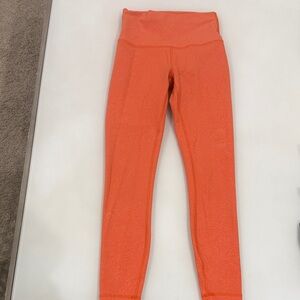Lululemon women’s Orange Leggings